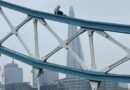 Tower Bridge shut down after man climbs onto railings as emergency services scramble to the scene