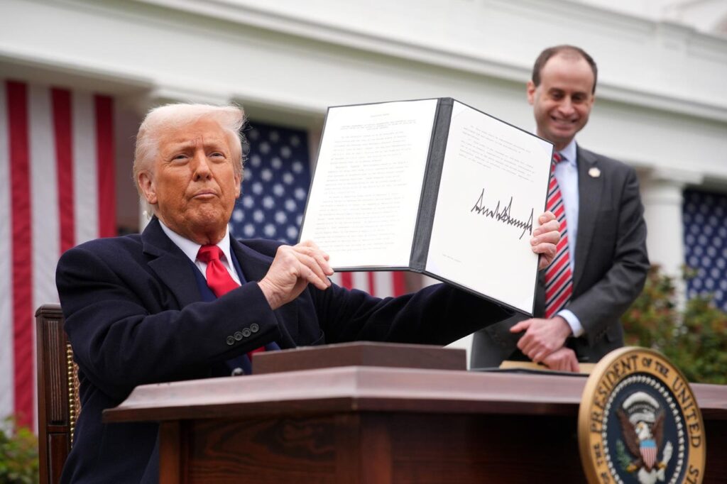 Trump Tariff Impact: New Fees Could Raise Prices, Cost Americans $2,400 Per Year