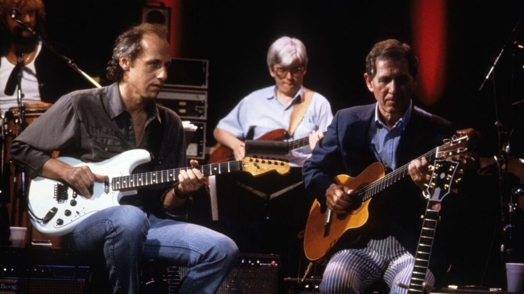 “Chet had such facility and knowledge, and yet what he wanted to do was play two chords all morning long. He’d say to me, ‘You’re pretty good, but you’re no Mark Knopfler’”: Mark Knopfler looks back on his jams with fellow fingerstyle legend