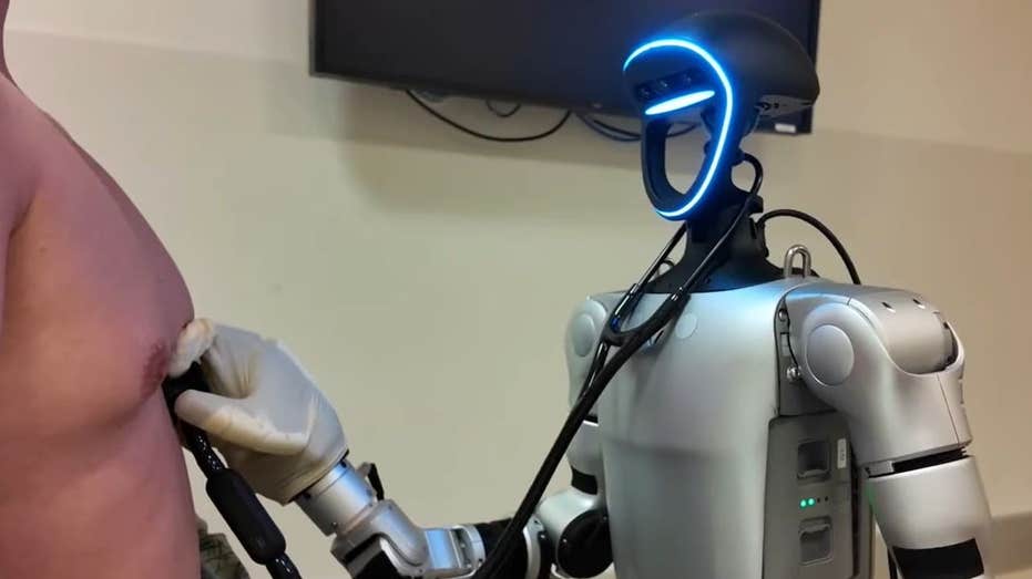 Humanoid robot performs medical procedures via remote control Humanoid robot performs medical procedures via remote control