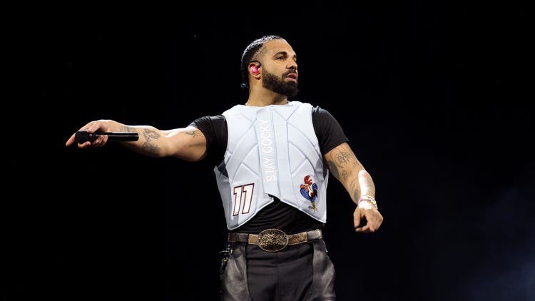 Drake Pays Tribute To Ozzy Osbourne In Birmingham After Rock Legend’s Death: “Rest In Peace” Drake Pays Tribute To Ozzy Osbourne In Birmingham After Rock Legend’s Death: “Rest In Peace”