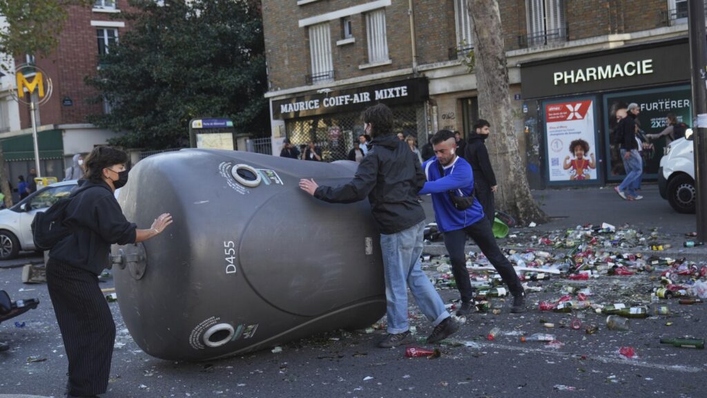 200 arrested in France as protesters clash with police