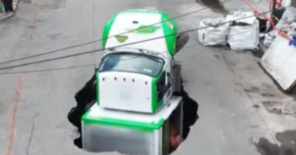 WATCH: Sinkhole Swallows Soda Delivery Truck In Mexico City