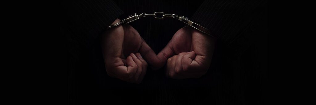 US indicts three cyber pros who moonlit for ransomware gang US indicts three cyber pros who moonlit for ransomware gang