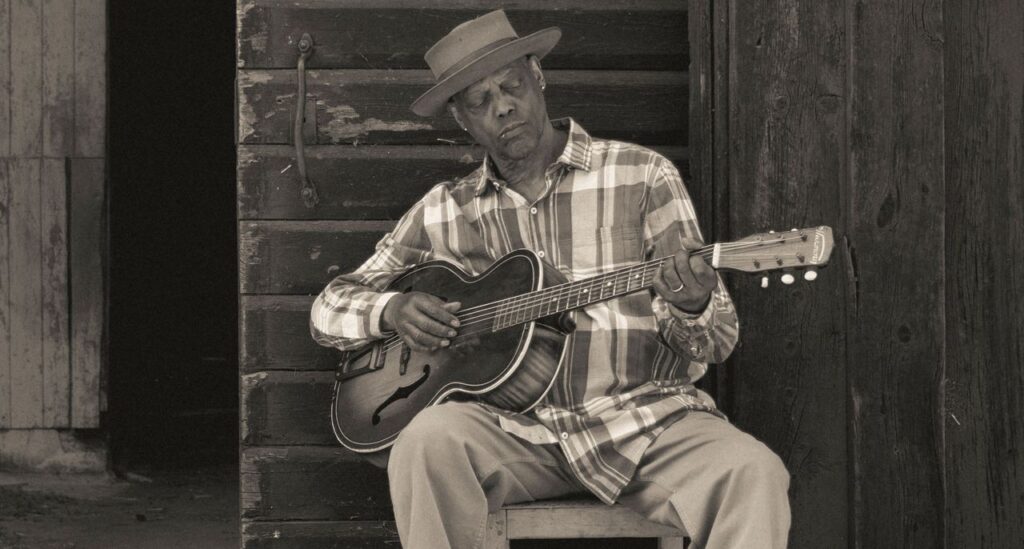“A call for peace, justice, and unity in a divided world”: Eric Bibb pays tribute to blues pioneer Muddy Waters in new single – taken from upcoming album with John Mayer and Paul McCartney collaborator