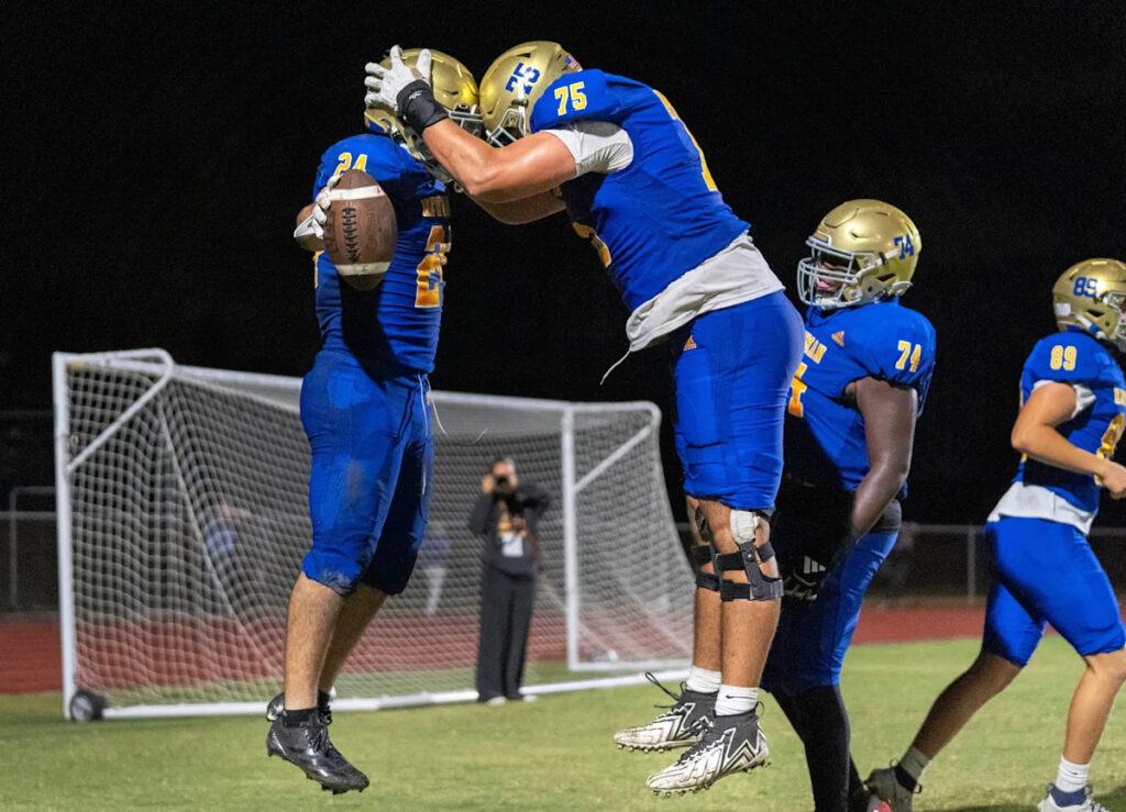 Cardinal Newman football led by Hughley, Donghia's 6 touchdowns