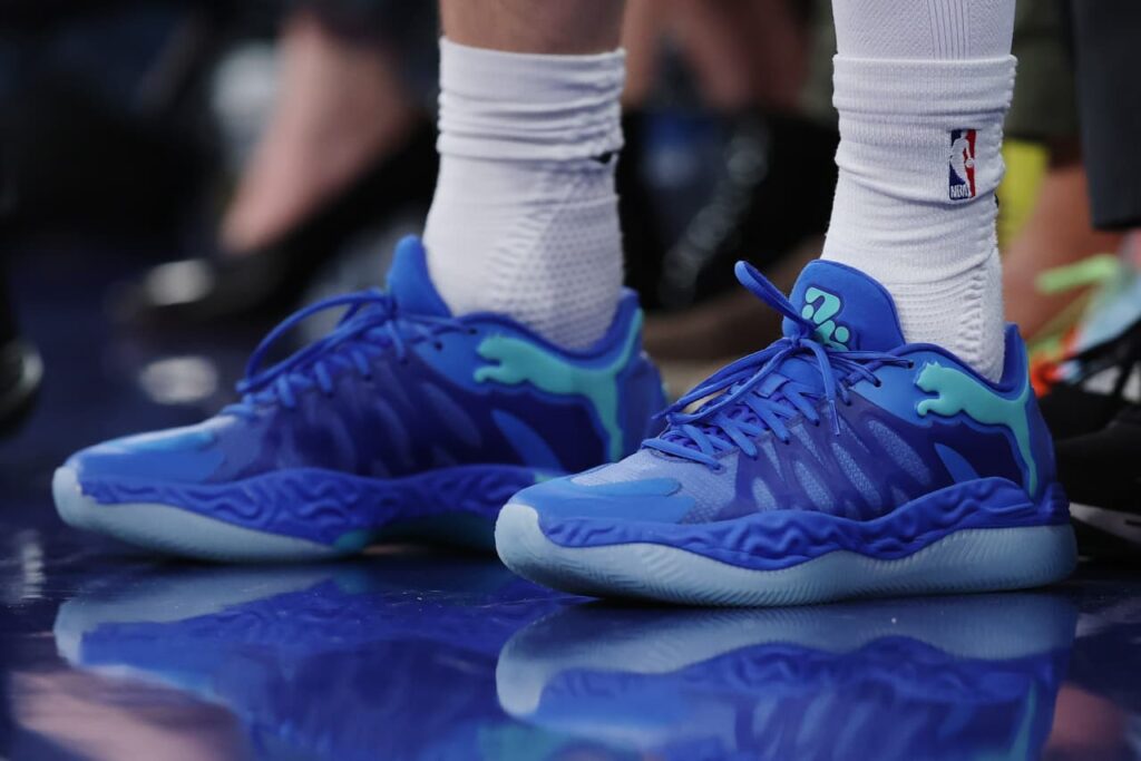 Beaten-down Puma shares are soaring. The sportswear maker may have a suitor.