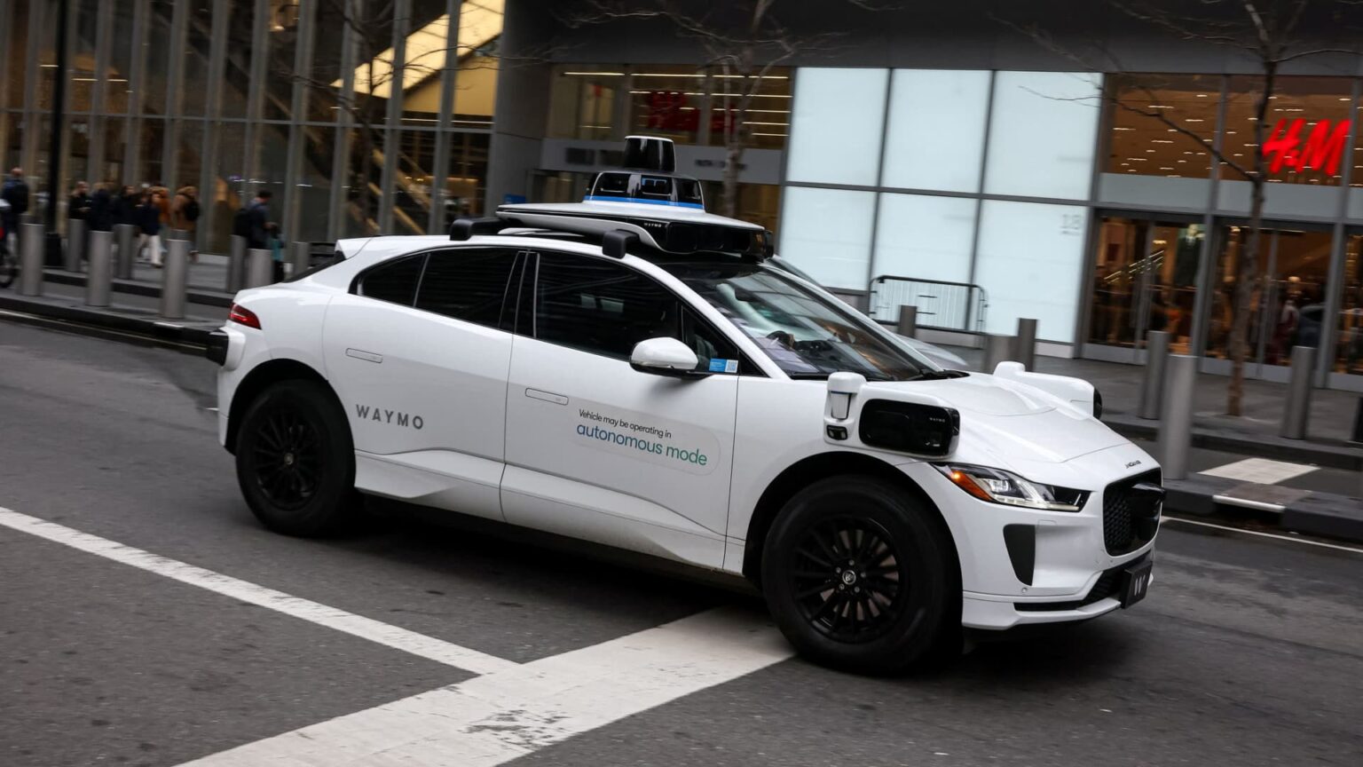 Waymo crosses 450,000 weekly paid rides as Alphabet robotaxi unit widens lead on Tesla