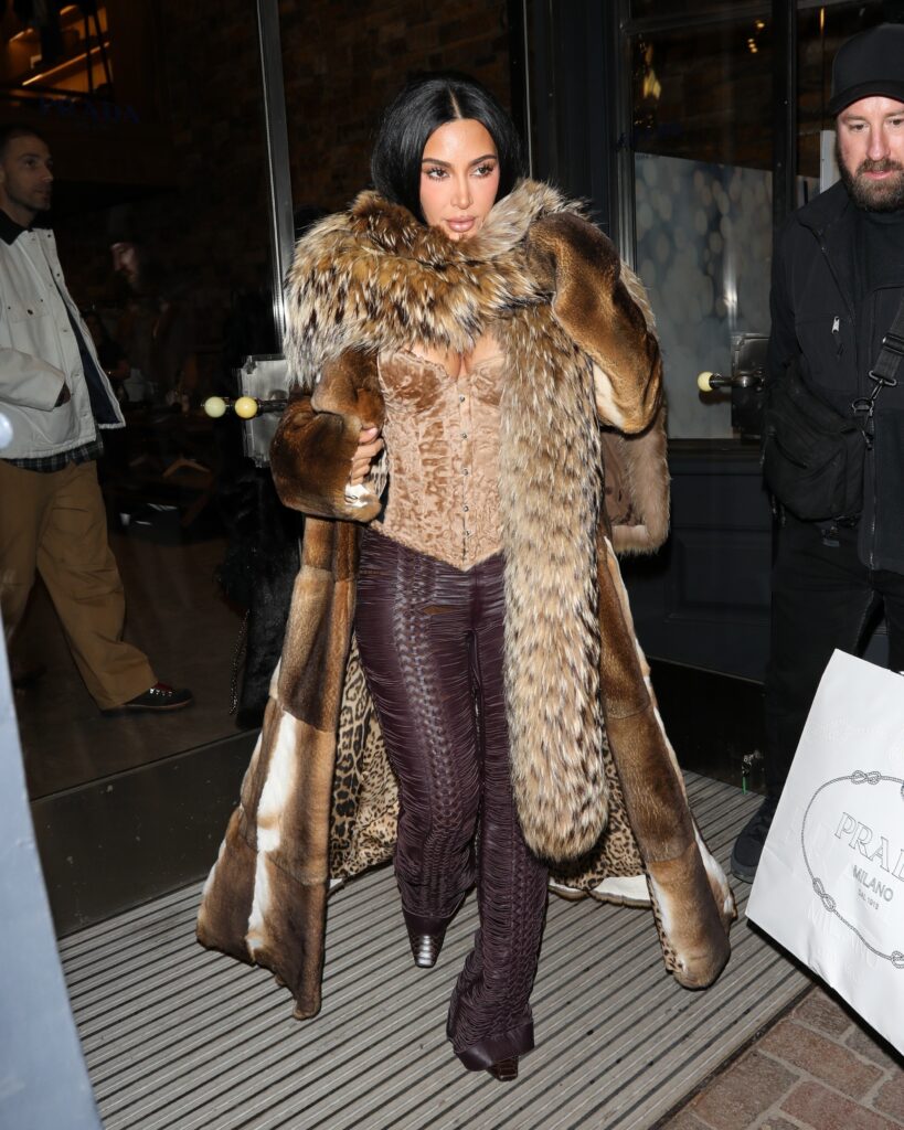Kim Kardashian heats up Aspen in velvet corset and lace-up leather pants