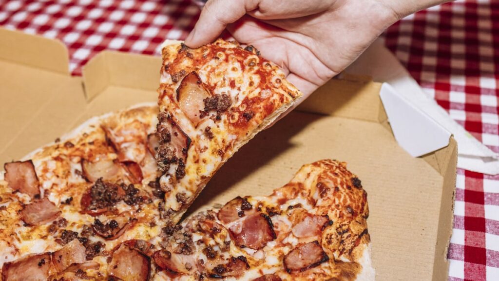 National Pizza Day 2026 is here — celebrate with deals and freebies from 7-Eleven, Chuck E. Cheese, and more