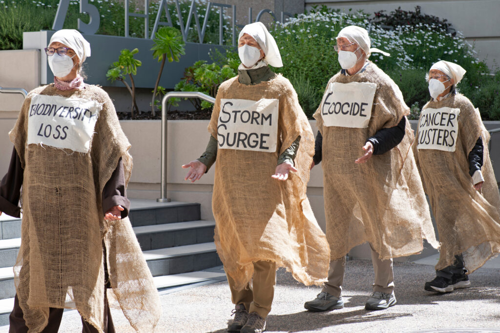 Climate Activists Stage Mock Funeral for Landmark Climate Rule Climate Activists Stage Mock Funeral for Landmark Climate Rule