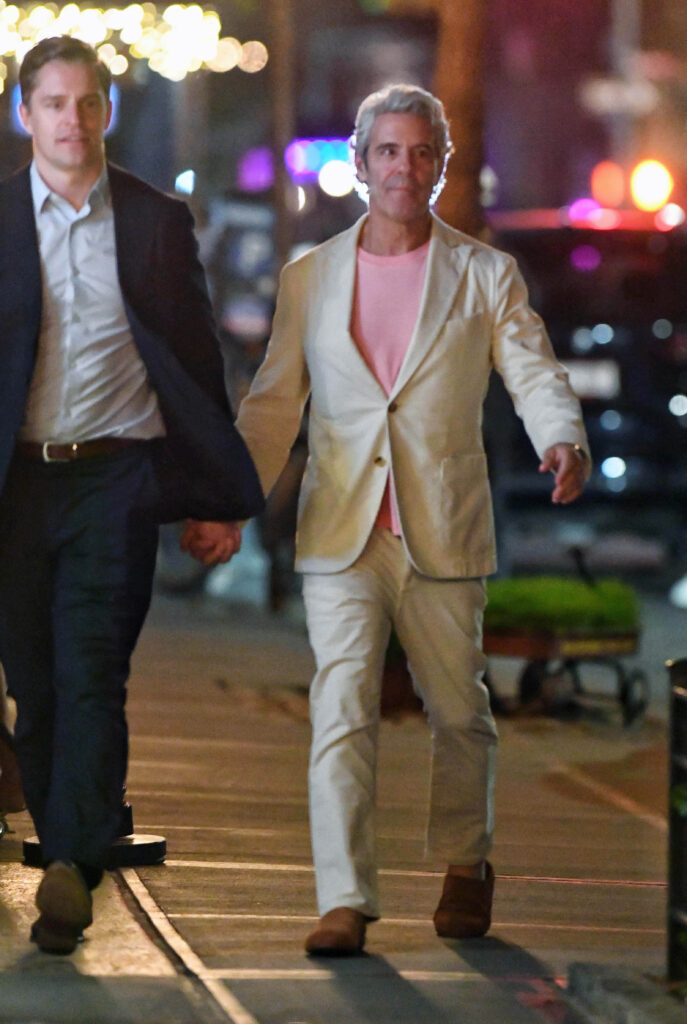 Andy Cohen holds hands with businessman Kevin Sobieski during NYC birthday outing