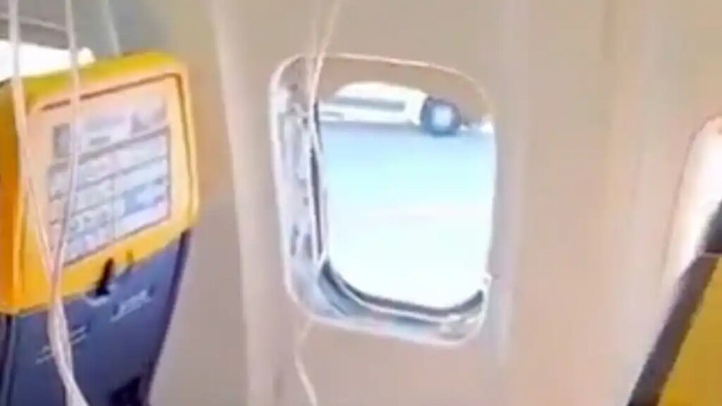 Ryanair plane makes emergency landing after window breaks