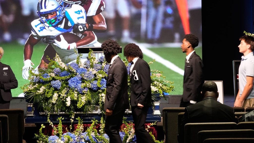 “Never Stop Saying His Name”: Nolan Wells’ Grieving Parents Speak At His Funeral “Never Stop Saying His Name”: Nolan Wells’ Grieving Parents Speak At His Funeral