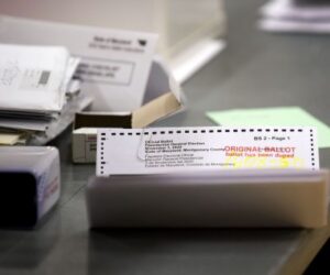 Postal Service publishes mail-in voting rule despite court injunctions