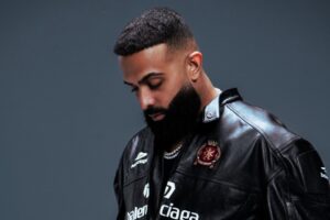 It’s a ‘Polaroid’ Moment for Eladio Carrión With Second Latin Airplay No. 1