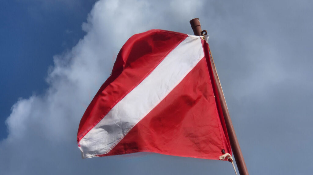 What Does A Red And White Flag Mean In Boating?